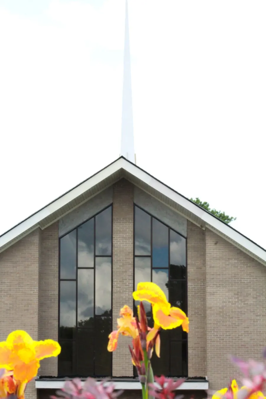 The white steeple rising above the sanctuary